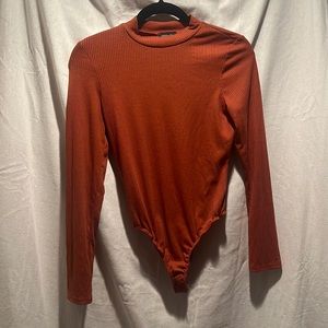 ***Just in time for fall-Ladies Medium Bodysuit